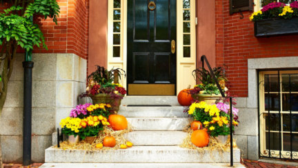 a photo of a house's front door decorations for halloween
