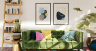 green couch and abstract art in a living room of a house showing
