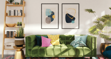green couch and abstract art in a living room of a house showing
