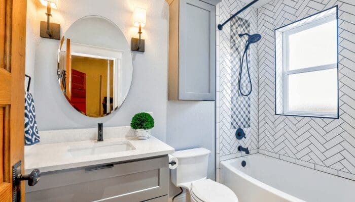 When staging your bathroom, make sure all the hardware finishes on your cabinets and drawers match.