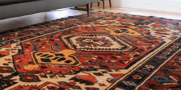 When staging your bathroom, use an area rug rather than a bath mat to set the scene.