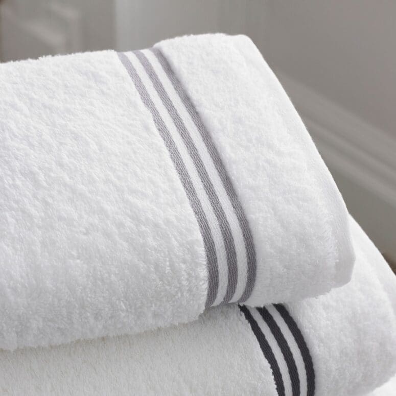 Fluffy, matching towel sets can make any bathroom feel hotel luxury.