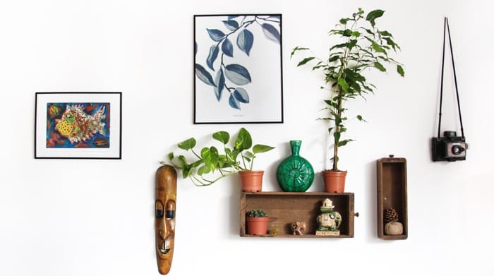 Possessions hanging neatly on a wall after downsizing a home.