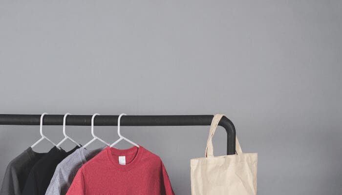 Clothes hanging neatly with help from Marie Kondo.