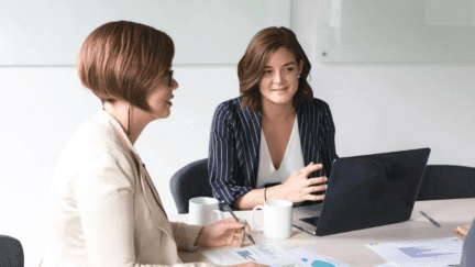 Two women going over an appraisal report.