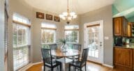 A dining room in a home that is inspected by buyers.