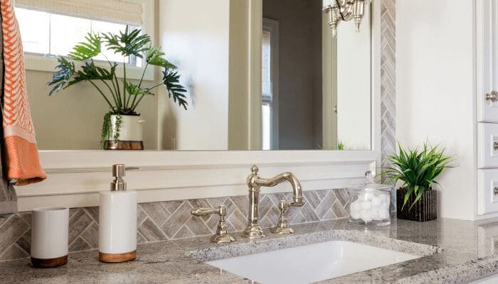 A bathroom in a house that is staged.