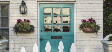 A teal door that helps sells homes in spring.