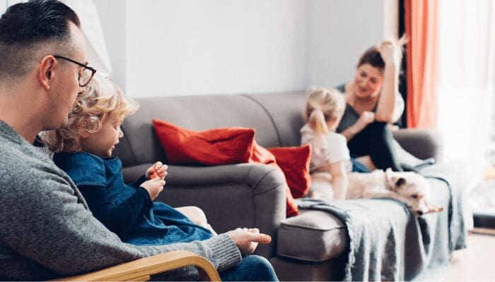 Parents explaining to their kids they are selling the house in the summer.