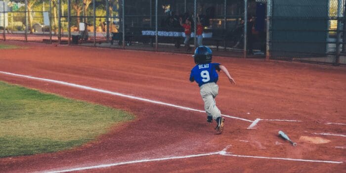 little league player in a family neighborhood