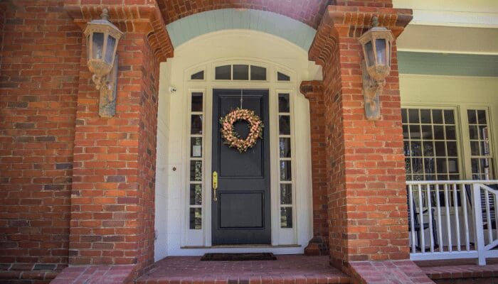 A front door color on a brick house.