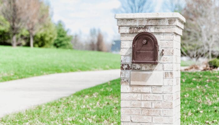 A stone mailbox with curb appeal.