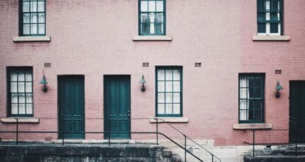 An apartment building, which is a type of real estate investment.
