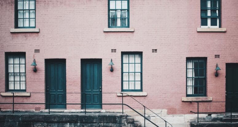 An apartment building, which is a type of real estate investment.
