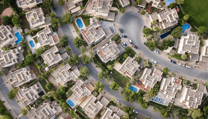 An aerial view of houses that could be in the housing market recession.
