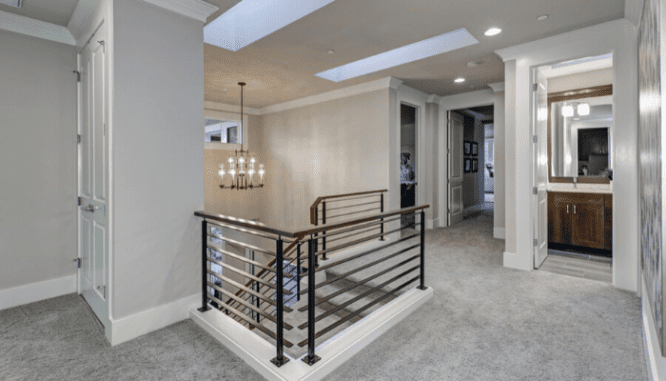 A hallway with new carpet that increased home value.