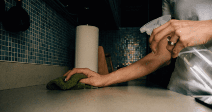 A woman cleaning a house during coronavirus.