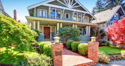 A house with plants used for curb appeal.