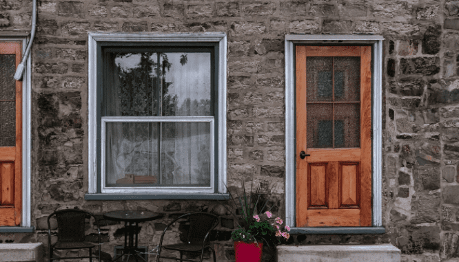 Assess if you want to paint over stone or brick when fixing the exterior of a house to add value