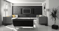 A black and white themed living room, and example of optimizing the furniture arrangement in a new house.