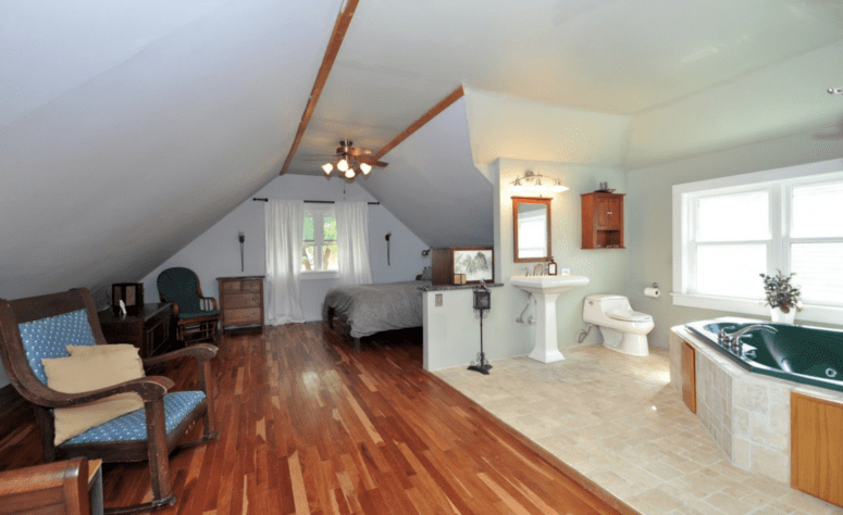 An open concept bathroom in a master suite.
