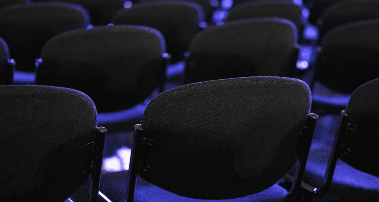 A row of auction chairs.