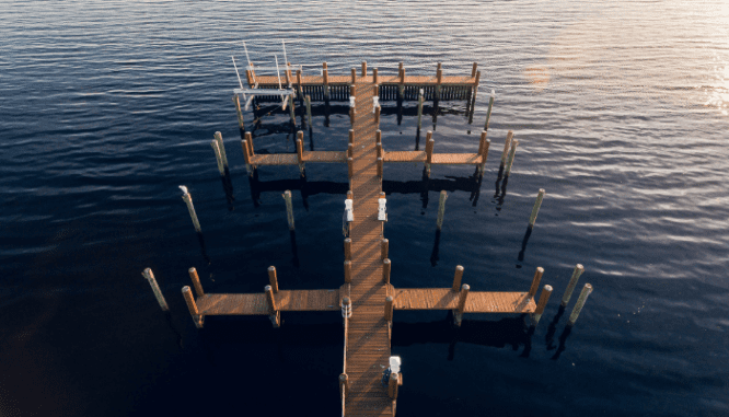 A dock behind a waterfront home you can buy.