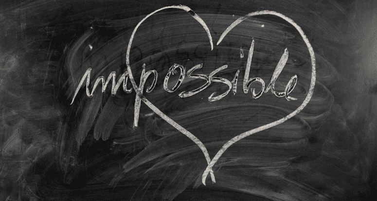 Impossible written on a chalkboard.