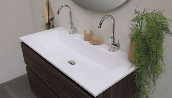A sink with new hardware in a home.