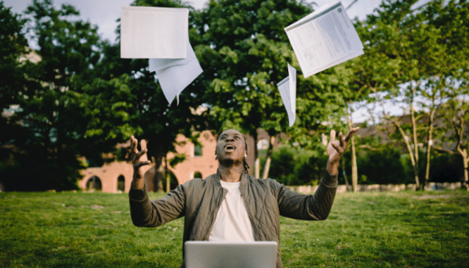 An agent throwing paper after switching to a digital paper trail.