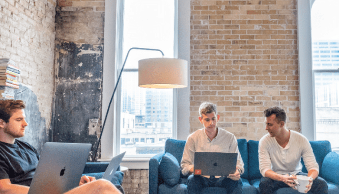 A real estate attorney working on a laptop.