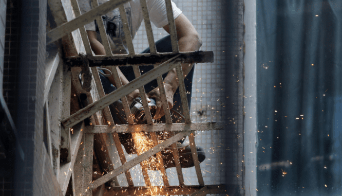 A contractor renovating a home in 2021.