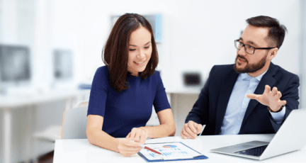 A bilingual real estate agent helping a client.