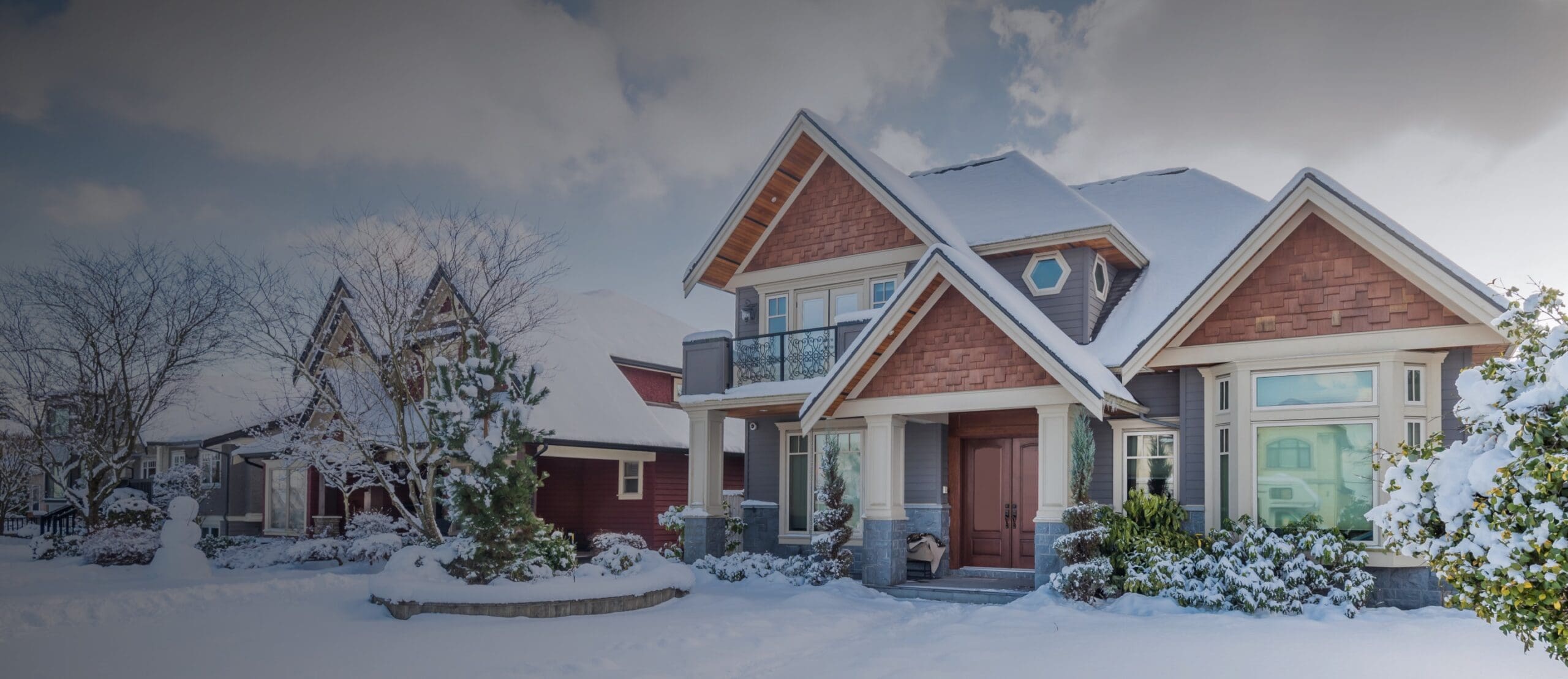 Snow-covered suburban home in winter, representing Top Agent Insights for Q4 2020.