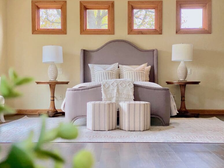 A bedroom that has an updated style.