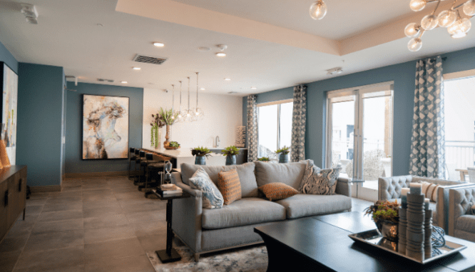 A living room with lights to demonstrate if you can sell a house with an old fuse box.