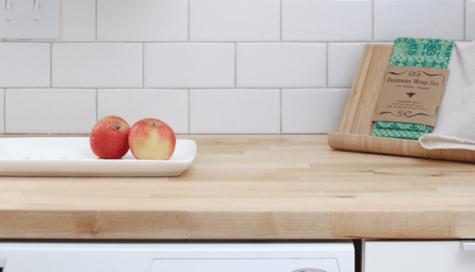 A countertop that uses butcher's block as the material.