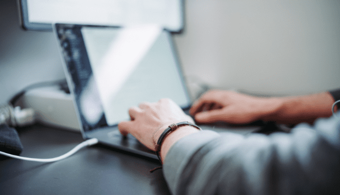 An image of a person searching for information about short sales for buyers.