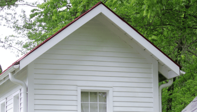 The roof of a cape cod house.