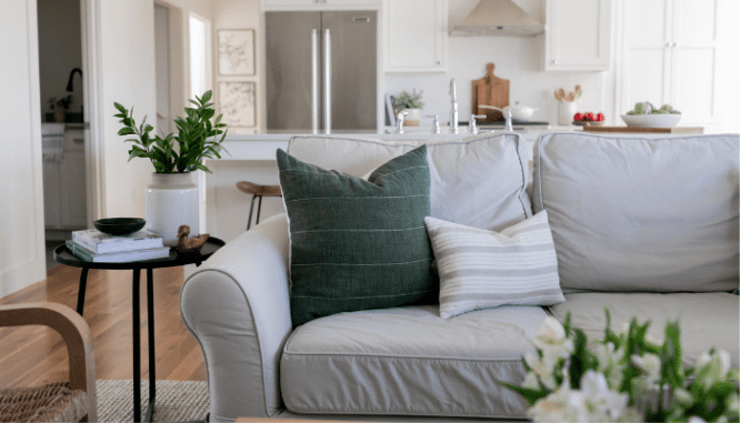 An image of a couch used to demonstrate living room styles.