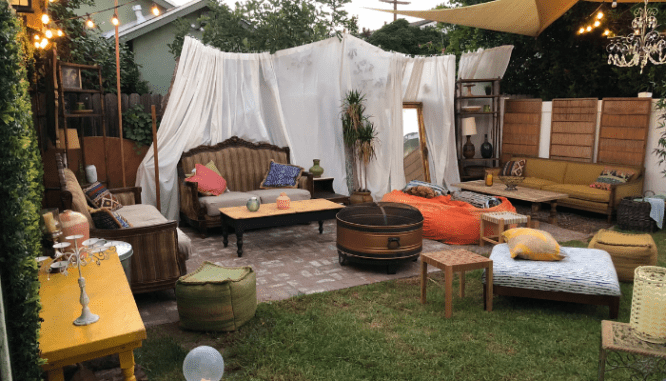 A backyard set up for a housewarming party.