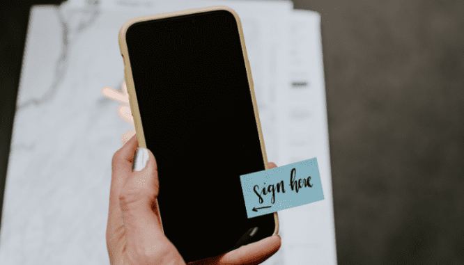 A person getting ready to sign off on their appraisal via their phone.