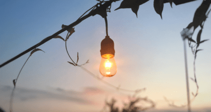 An image of a light bulb to demonstrate backyard lighting ideas.
