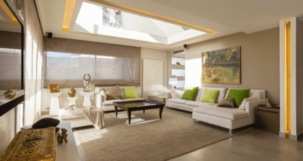 An image of a living room to demonstrate the process of home window replacement.