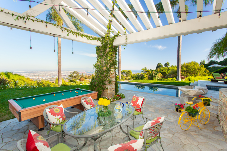 An image of a backyard to demonstrate backyard lighting ideas.