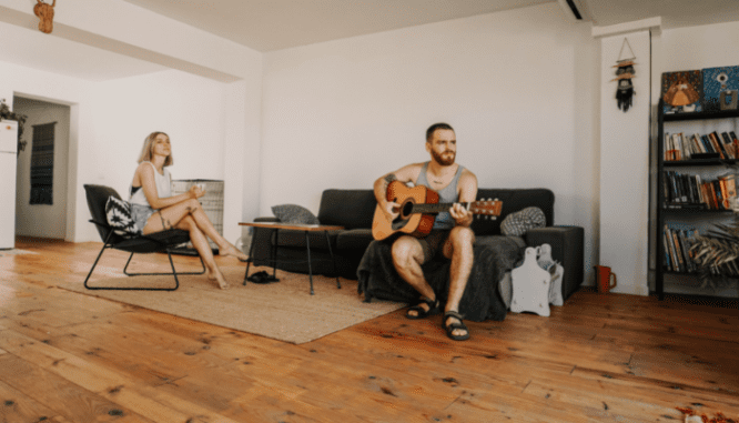 An image of a couple to demonstrate if you should borrow money to renovate your home.