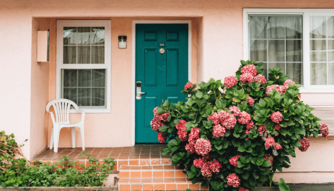 Replacing the front door is one way to do a home improvement for under $1,000.