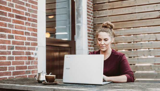 A woman using the internet to find property records anywhere.