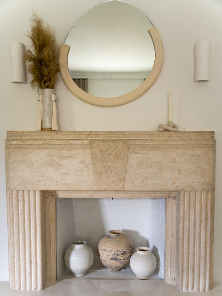 A beige fireplace that is a design idea.