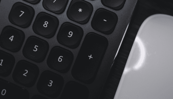 A computer keyboard focused on number keys to calculate online appraisals.
